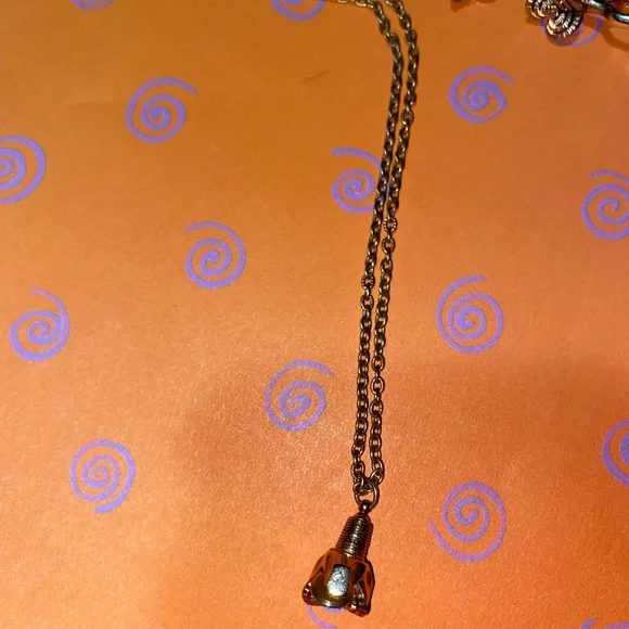 Elegant Gold Chain Necklace with Unique Charms